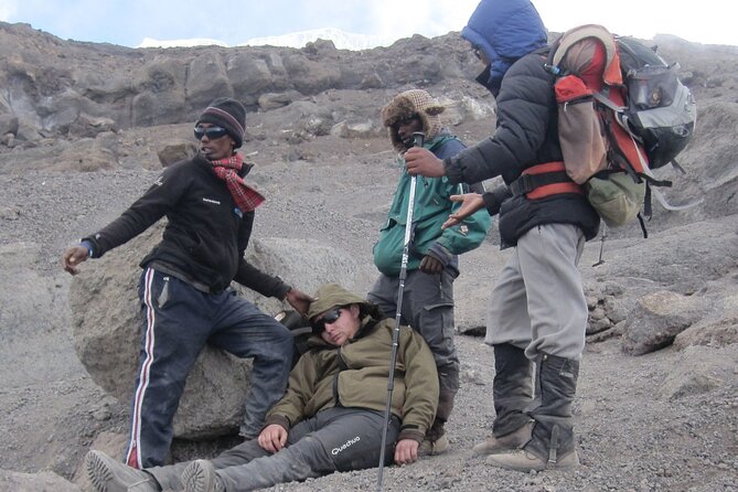 7 Days Kilimanjaro via Machame route affordable price - Day 6: Mweka descent, certificates, and a hot shower