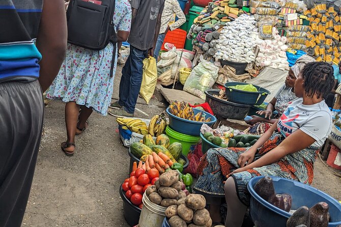 Arusha: Traditional Tanzania Cooking Class & Food Market Tour - Sitting down to eat what you made