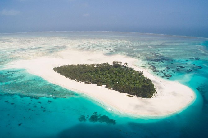 Half Day Zanzibar Mnemba Atoll Marine Reserve Snorkeling Tour - Fruit, water, and the missing lunch question