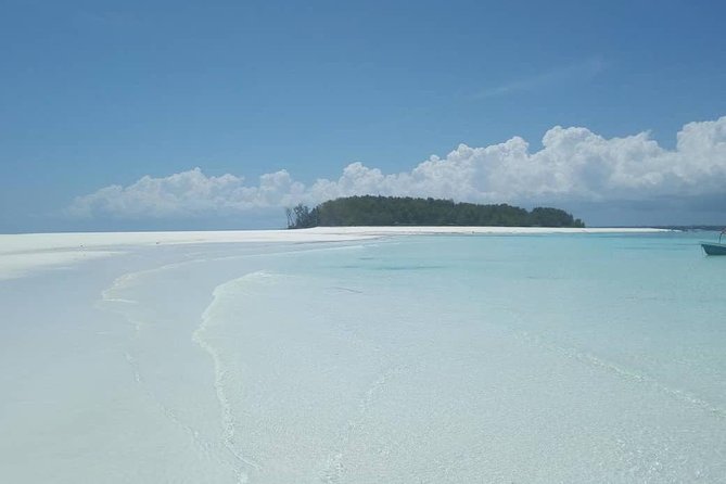 Half Day Zanzibar Mnemba Atoll Marine Reserve Snorkeling Tour - The 20-minute boat ride to Mnemba Island