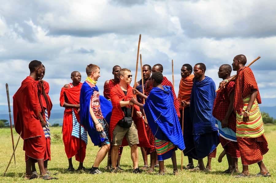 Kilimanjaro: Maasai Village Visit, Waterfalls, & Coffee Tour - Meeting the Maasai community near Kilimanjaro Airport
