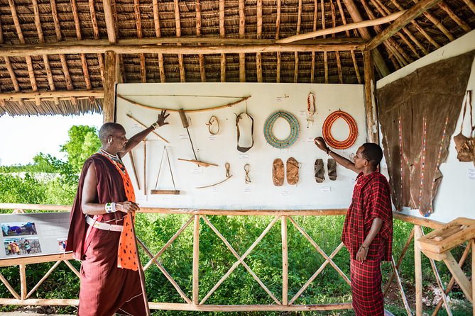Maasai World - Trying the traditional bow and arrow
