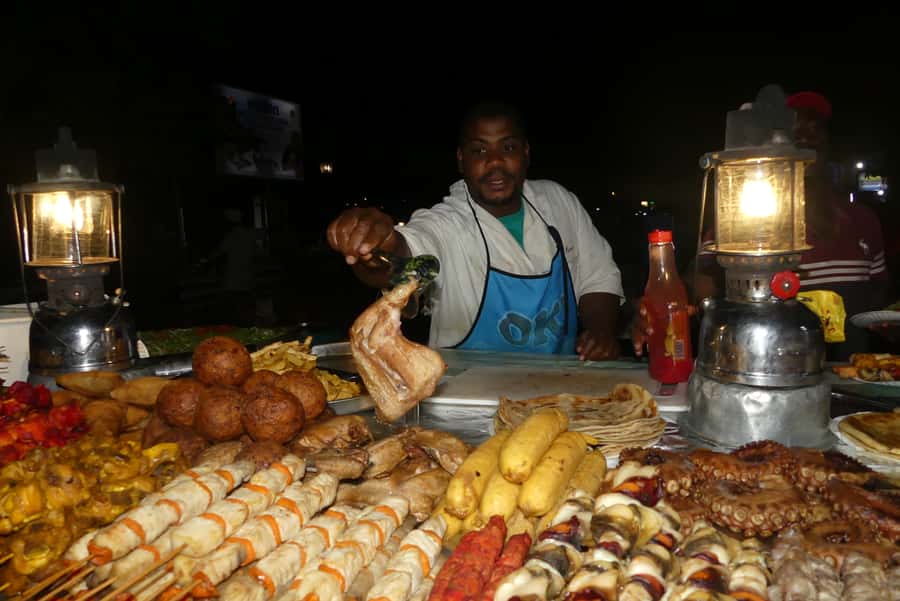 Stonetown: Food Markets and Street Food Walking Tour - Walking through Stone Town after dark