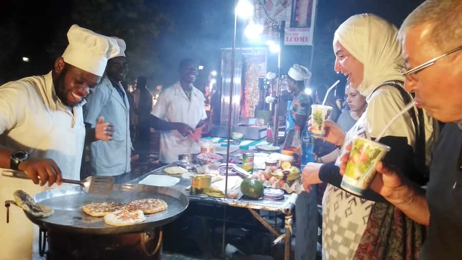 Stonetown: Food Markets and Street Food Walking Tour - Sunset, a local drink, and a change of pace
