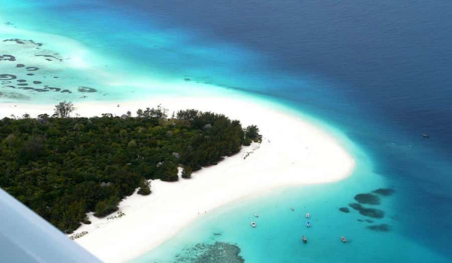 Zanzibar: Mnemba Island Atoll Guided Day Trip - Kuza Cave offers the day’s best cool-down