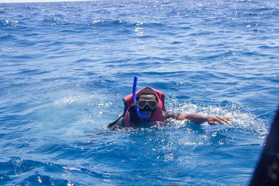 Zanzibar: Mnemba island Snorkeling & Boat Tour with Lunch - From Muyuni Beach to the snorkeling sites